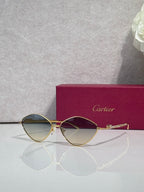 Gold-tone round sunglasses with olive-tinted lenses and thin metal frame