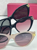 Cartier sunglasses set with three round styles in dark, cream, and pale pink frames