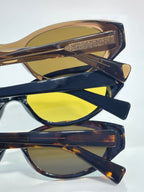 Tortoiseshell sunglasses with yellow lenses, stacked view