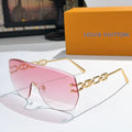 Louis Vuitton sunglasses with pink gradient lenses and gold chain detail frames