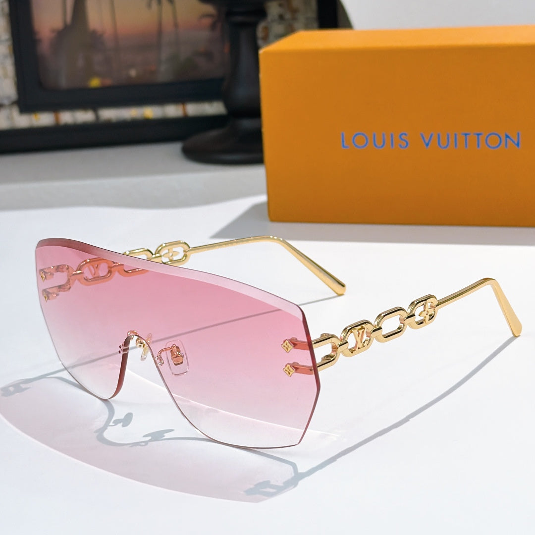 Louis Vuitton sunglasses with pink gradient lenses and gold chain detail frames
