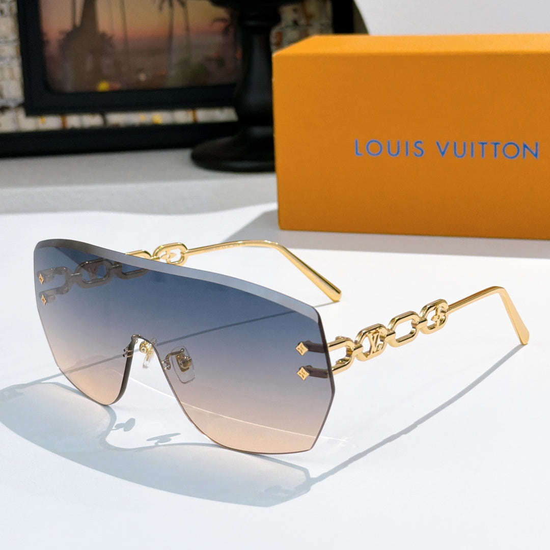 Louis Vuitton sunglasses with blue-to-pink gradient lenses and gold chain detail frames