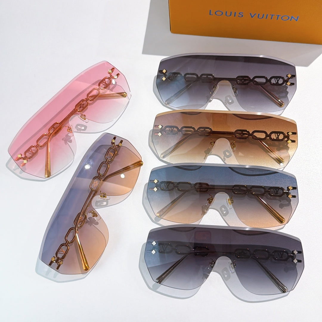 Louis Vuitton sunglasses with multiple tinted lenses and gold chain frames, laid out together