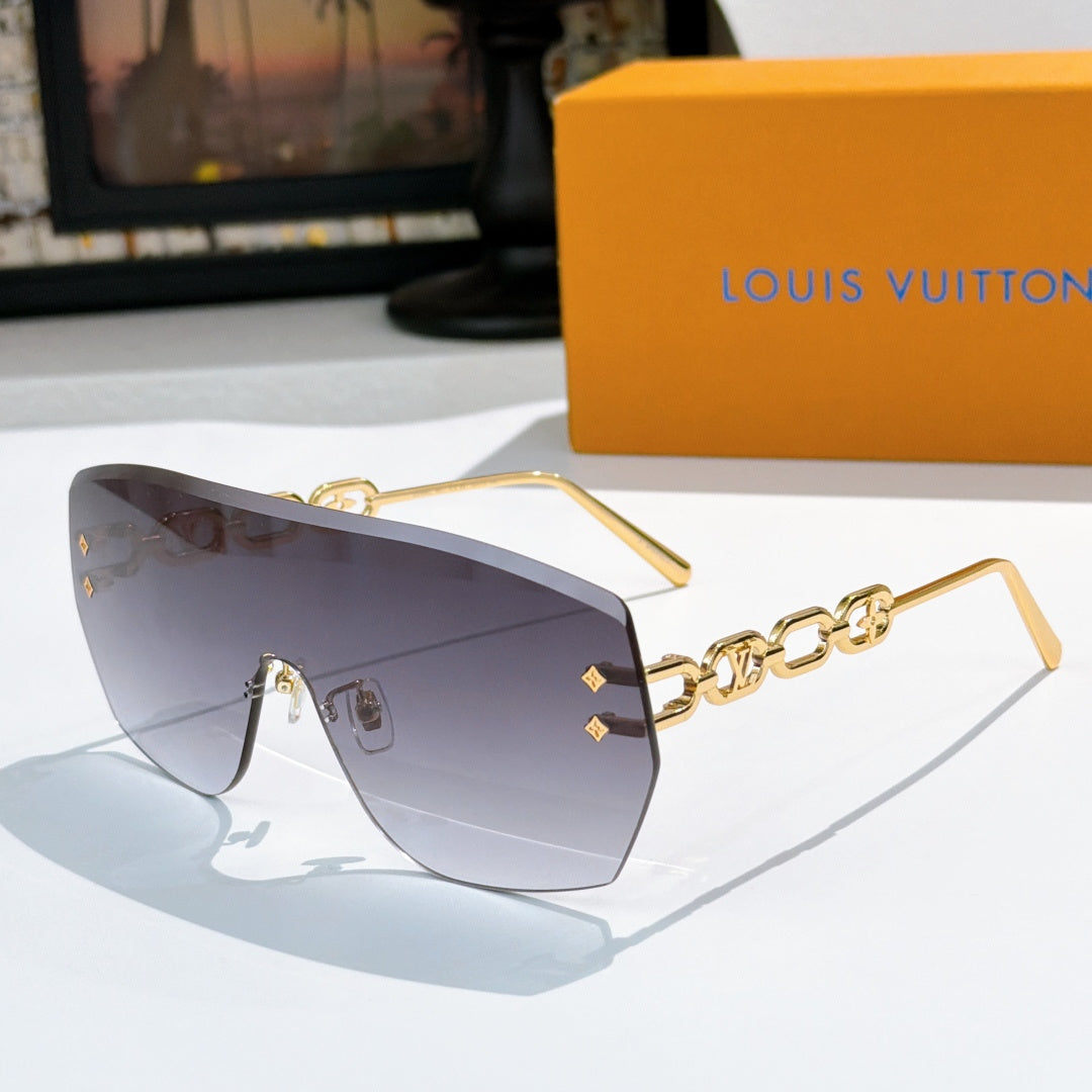 Louis Vuitton sunglasses with purple-to-gray gradient lenses and gold chain detail frames