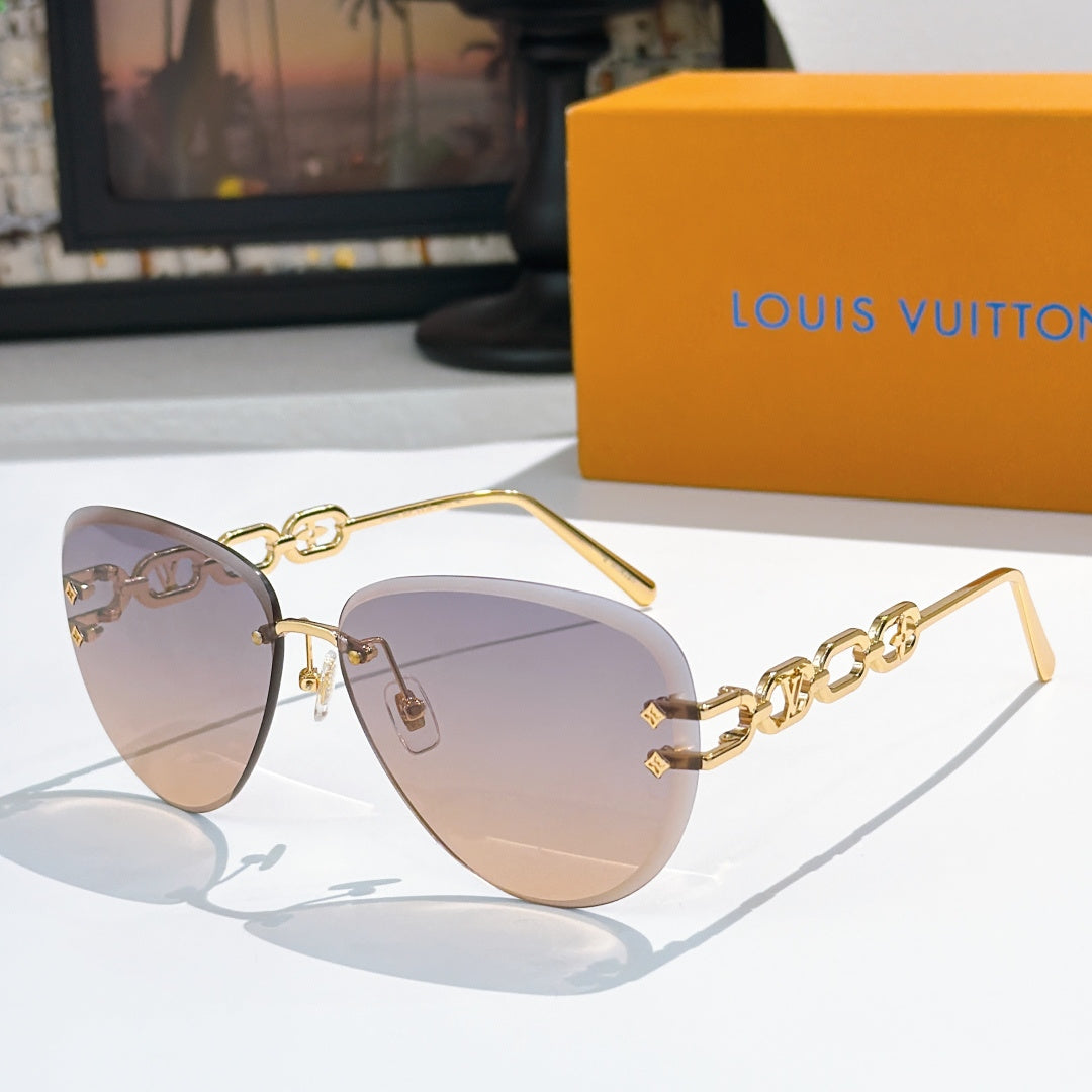 Louis Vuitton sunglasses with gold-tone frames and light brown gradient lenses