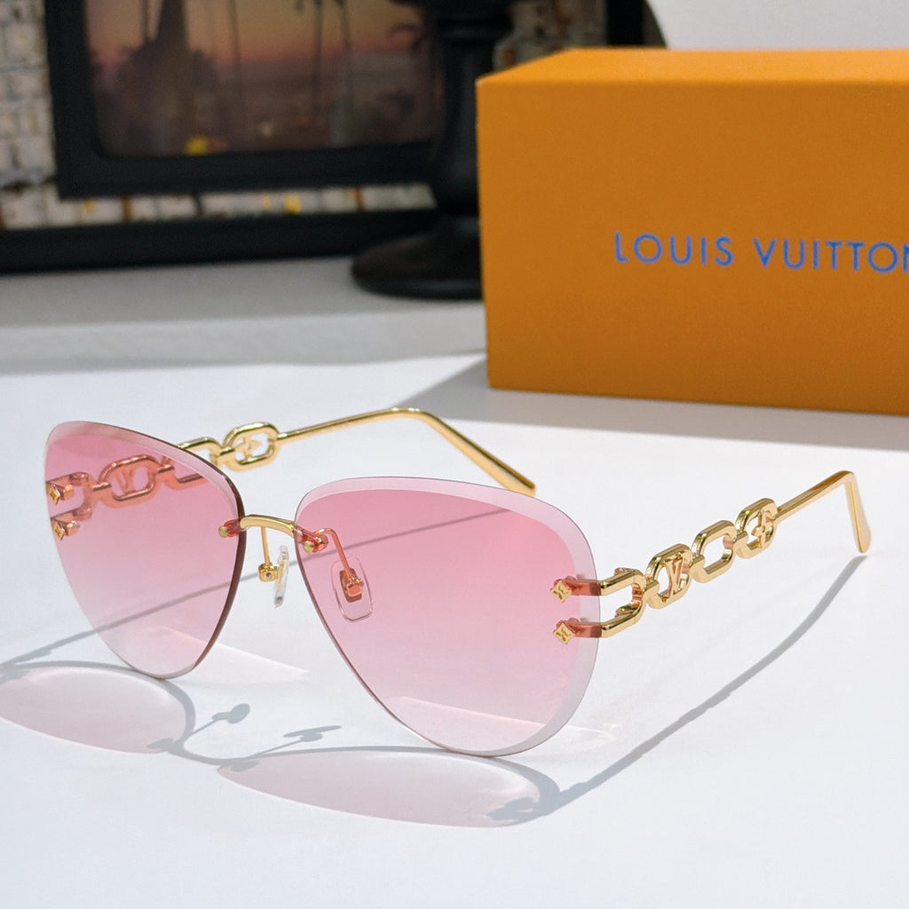 Louis Vuitton sunglasses with gold-tone frames and pink gradient lenses