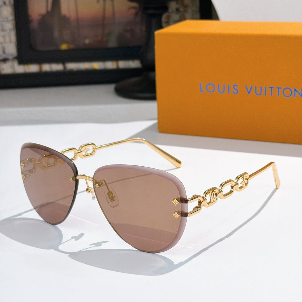 Louis Vuitton sunglasses with gold-tone frames and mauve gradient lenses