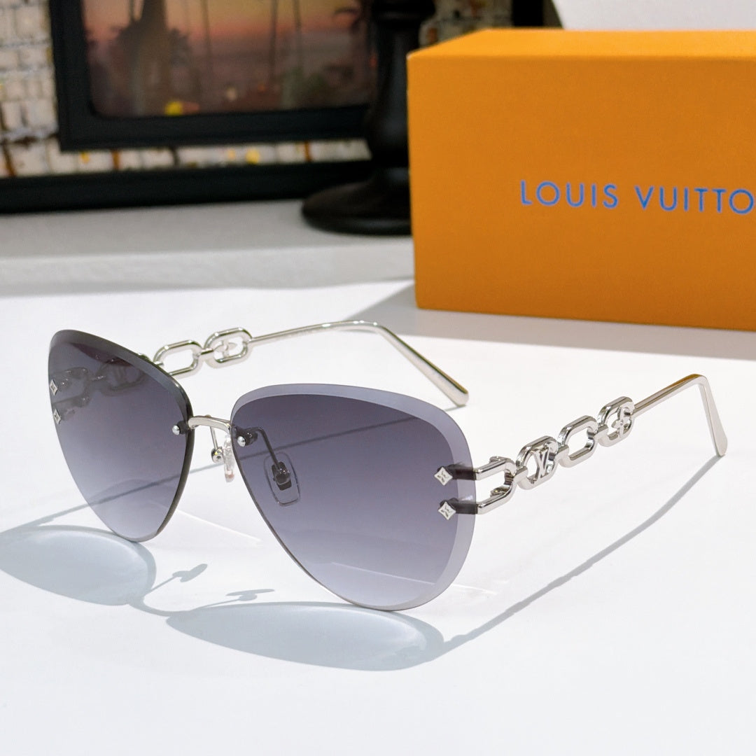 Louis Vuitton sunglasses with silver-tone frames and dark purple gradient lenses