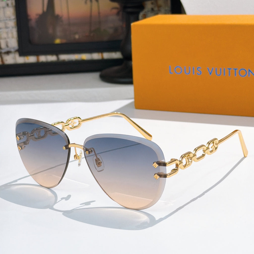 Louis Vuitton sunglasses with gold-tone frames and cool blue gradient lenses