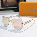 Louis Vuitton sunglasses with gold-tone frames and light brown gradient lenses