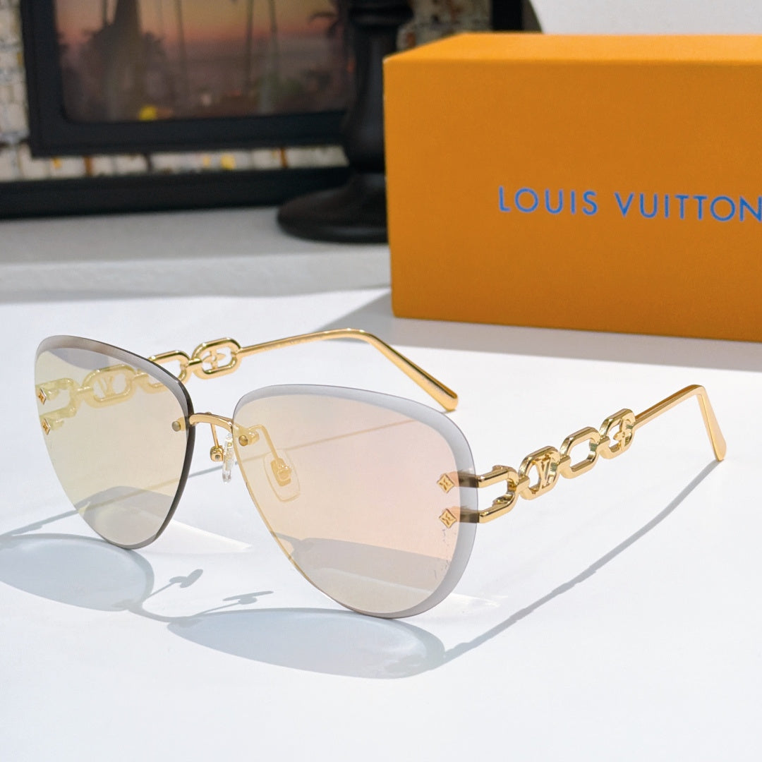 Louis Vuitton sunglasses with gold-tone frames and light brown gradient lenses