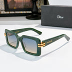 Dior square sunglasses, green translucent frames with gold bar and blue-tinted lenses