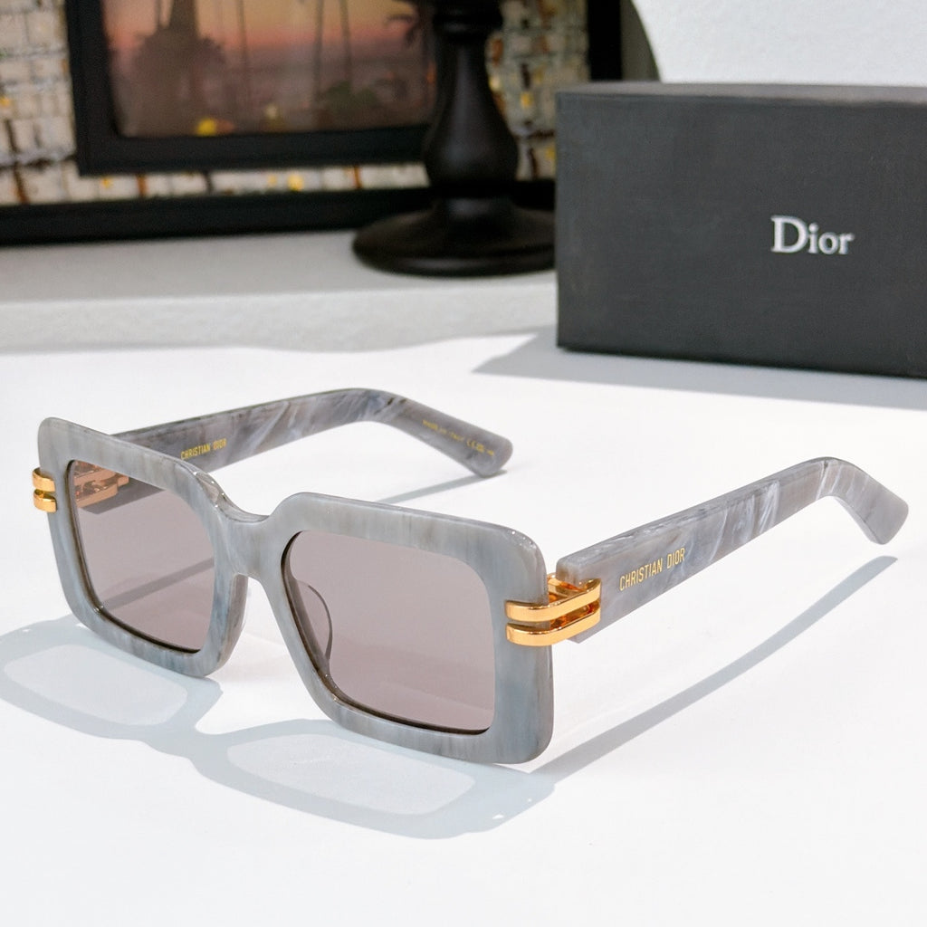 Dior square sunglasses, translucent gray frames with gold bar and light-tinted lenses