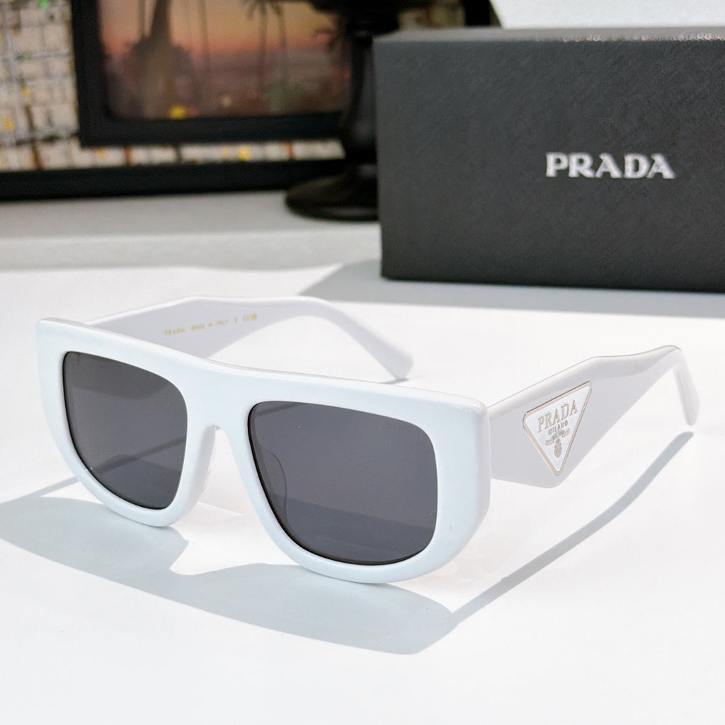 Prada sunglasses with white frames and dark tinted lenses, triangular logo on temple.