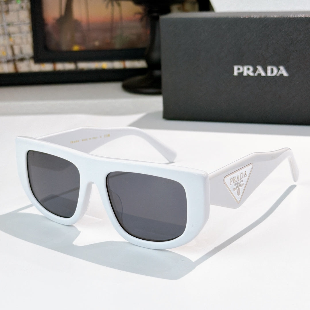 Prada sunglasses with white frames and dark tinted lenses, triangular logo on temple.