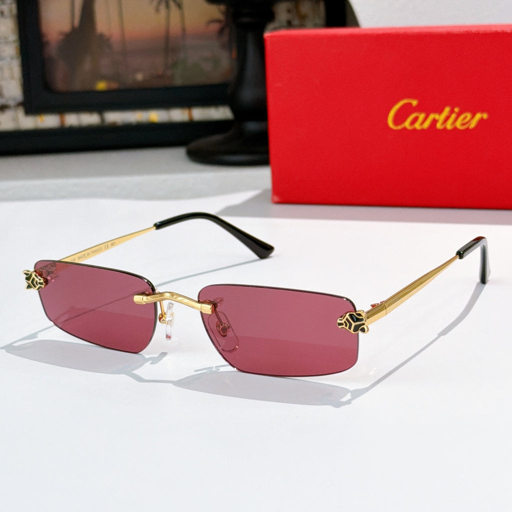 Gold frame glasses with pink tinted lenses and black temple arms