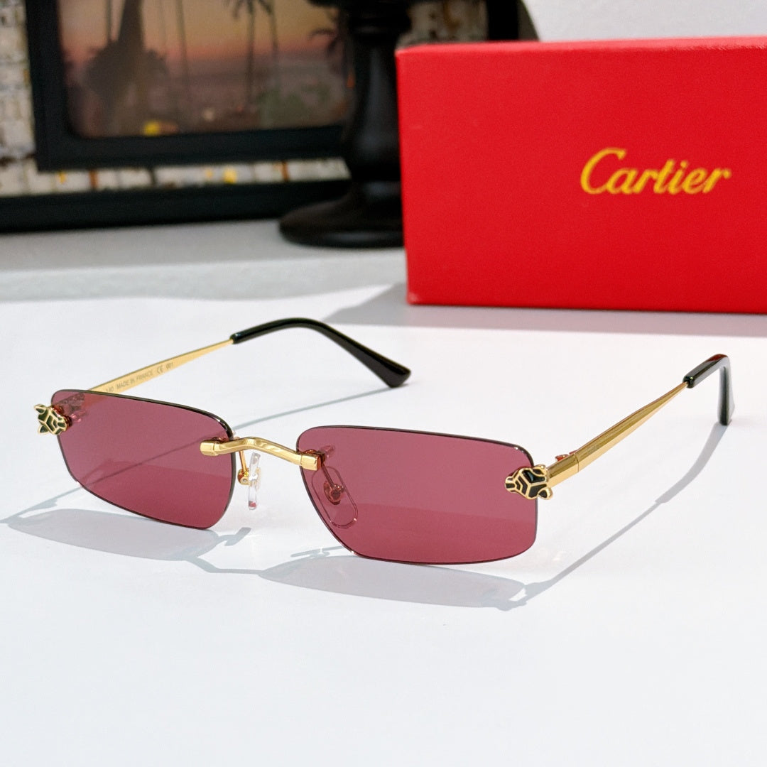 Gold frame glasses with pink tinted lenses and black temple arms