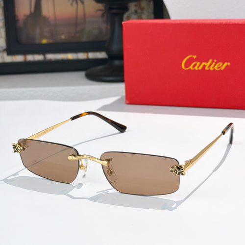 Cartier glasses with gold frame and dark brown tinted lenses, black temple arms