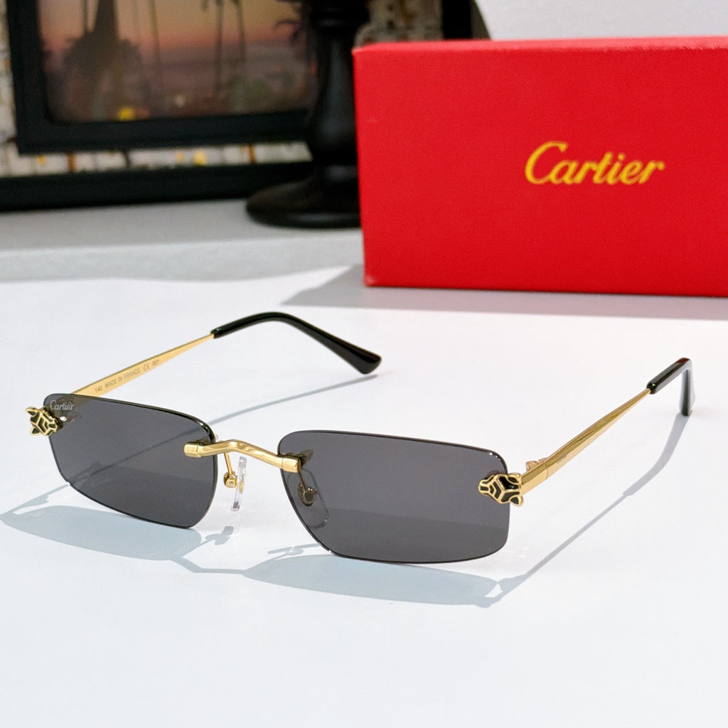 Gold frame glasses with gray tinted lenses and black temple arms