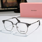 MiuMiu eyeglasses with dark gray full-rim frame and clear lenses, metal arms