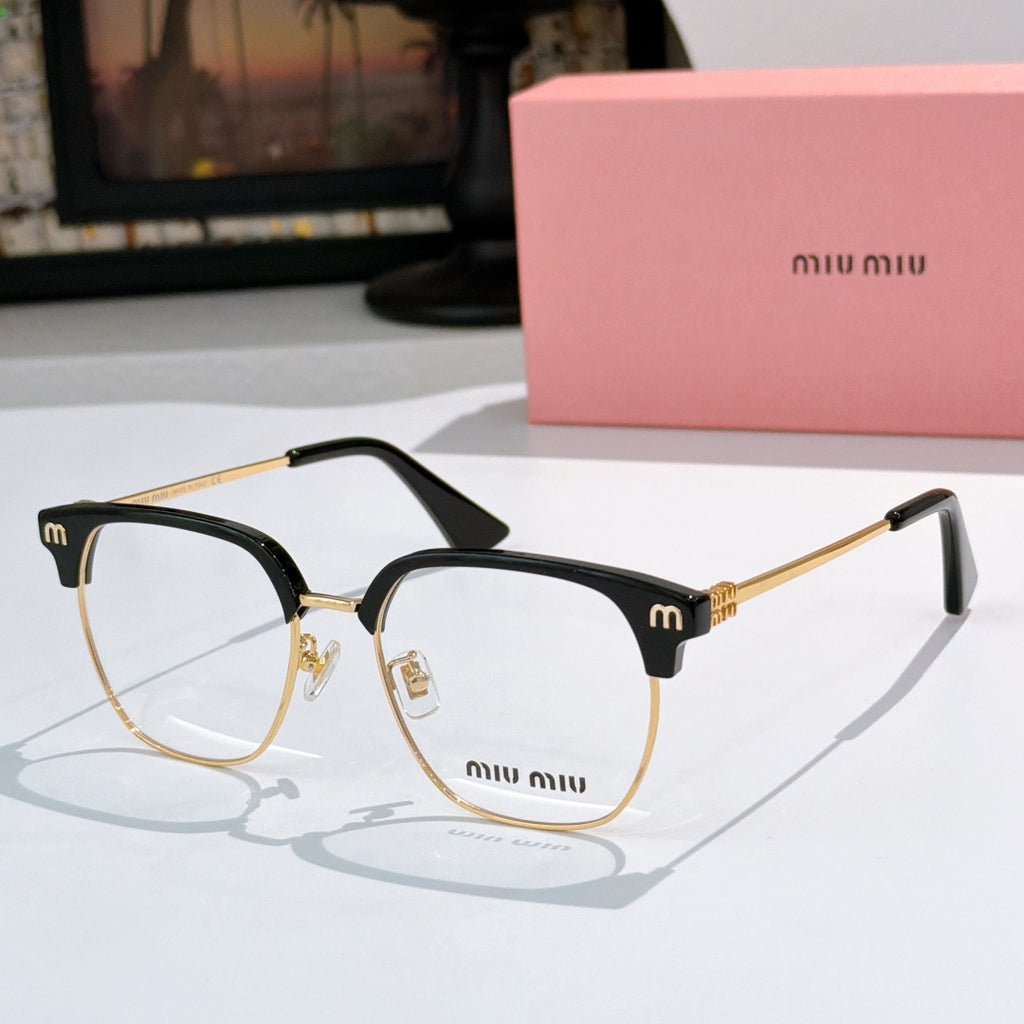 MiuMiu eyeglasses with tortoiseshell frame and gold-tone detailing, clear lenses