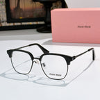 MiuMiu eyeglasses with black full-rim frame and clear lenses, metal temples