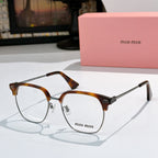 MiuMiu eyeglasses with tortoiseshell full-rim frame, clear lenses, metal temples