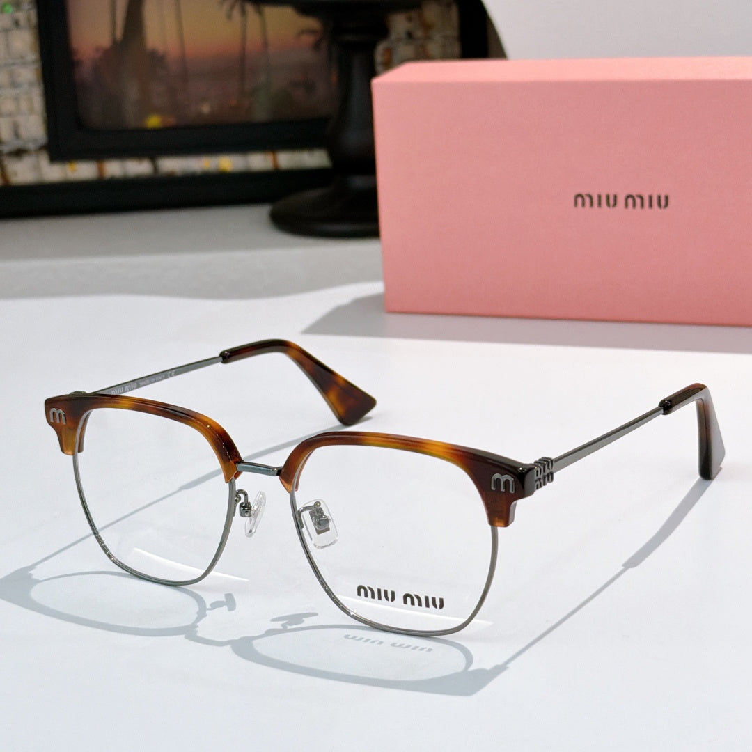 MiuMiu eyeglasses with tortoiseshell full-rim frame, clear lenses, metal temples
