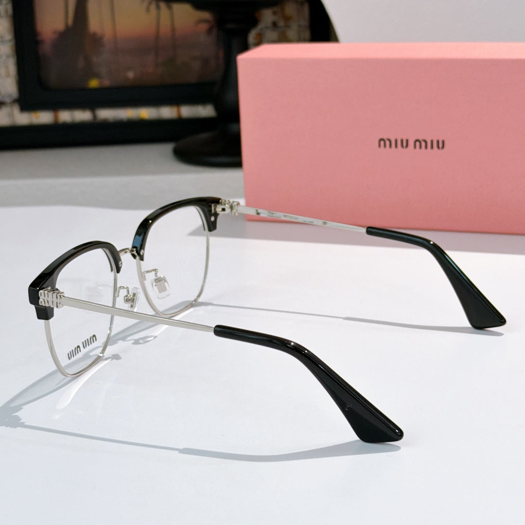 MiuMiu eyeglasses with black full-rim frame and clear lenses, side profile