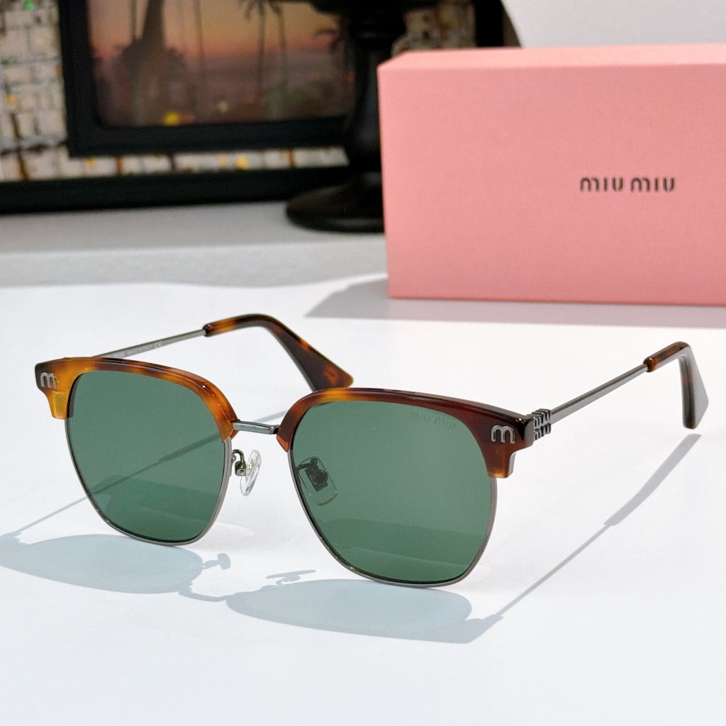 Sunglasses with green lenses and tortoiseshell frame, gold-toned hinges, logo detail on temples