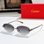 Cartier round sunglasses with gold frames, dark gray lenses, leopard-pattern temples.