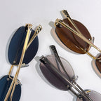 Cartier sunglasses assortment with gold frames and leopard temple accents, angled views.