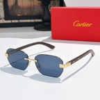 Cartier blue-tinted sunglasses with gold-tone hinges and dark brown temples