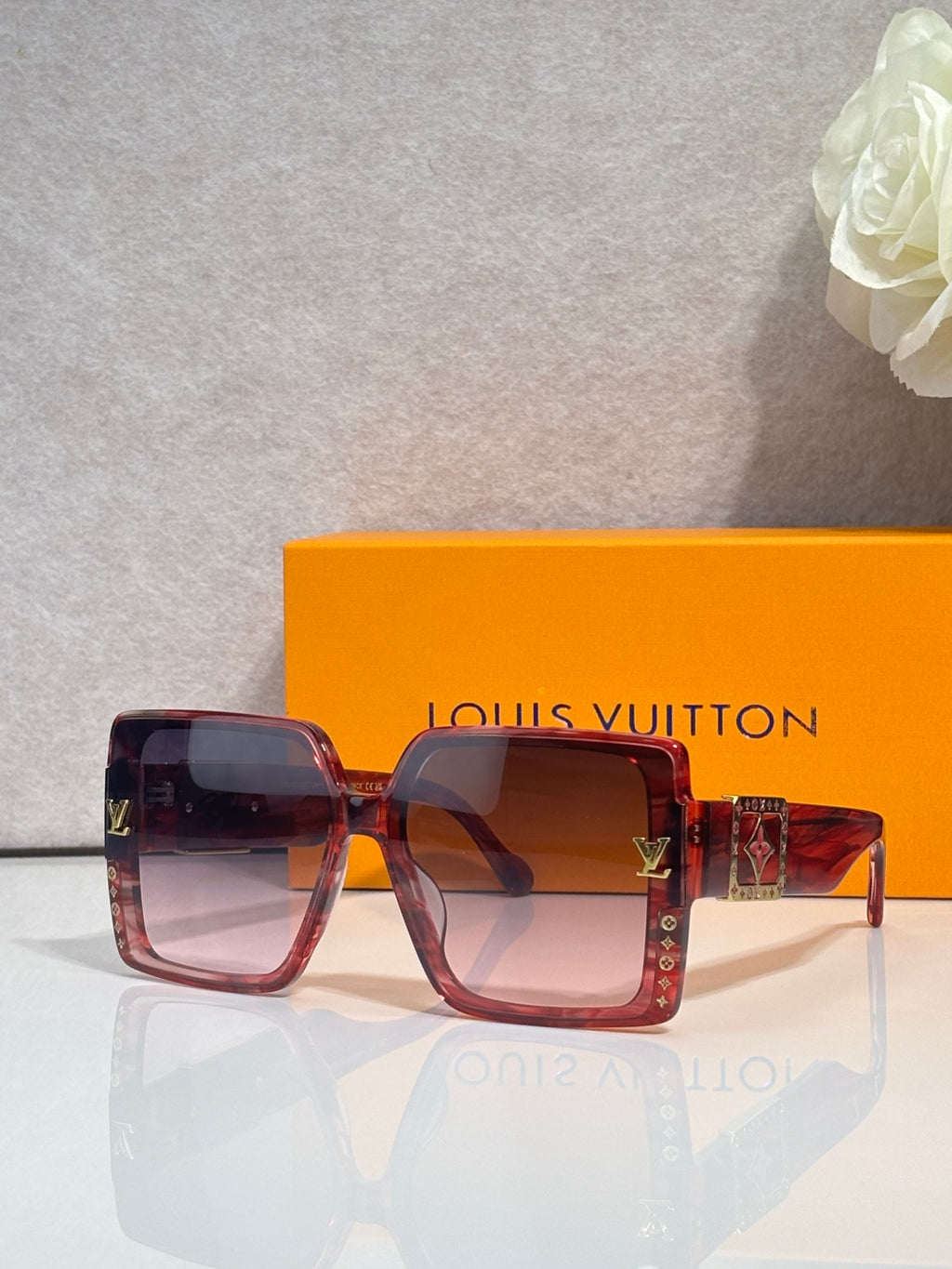 Louis Vuitton square sunglasses, tortoise and brown frames, tinted lenses, LV logo temples