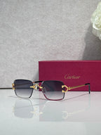 Cartier acetate eyeglasses with navy frame, purple-tinted lenses, and gold-tone hinges