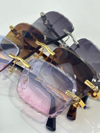Cartier glasses angled view with gold frame accents and dark tinted lenses