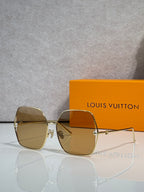 Louis Vuitton square sunglasses with amber-tinted lenses and gold-tone frame