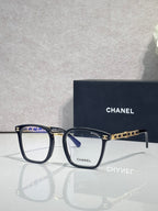 Chanel blue rectangular eyeglasses with gold chain link temple accents