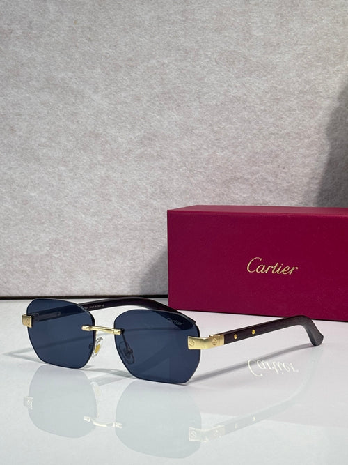 Cartier sunglasses with dark blue lenses, black frame, gold-tone temples