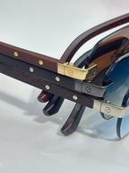 Cartier sunglasses side view with wood-texture temple arms and gold-tone hardware