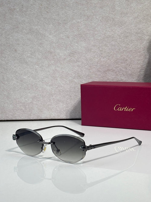 Cartier sunglasses with dark lenses and black metal frame, round shape
