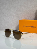 Louis Vuitton sunglasses with dark brown lenses and gold-tone aviator-style frames.