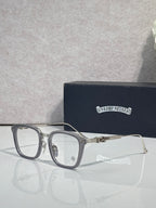 Silver-toned rectangular eyeglasses with clear lenses and metal bridge detail
