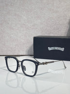 Navy eyeglasses with rectangular clear lenses and silver-toned metal arms