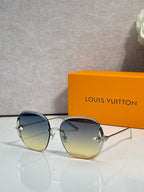 Louis Vuitton glasses with round blue-gray lenses, gold frame and metal temple accents