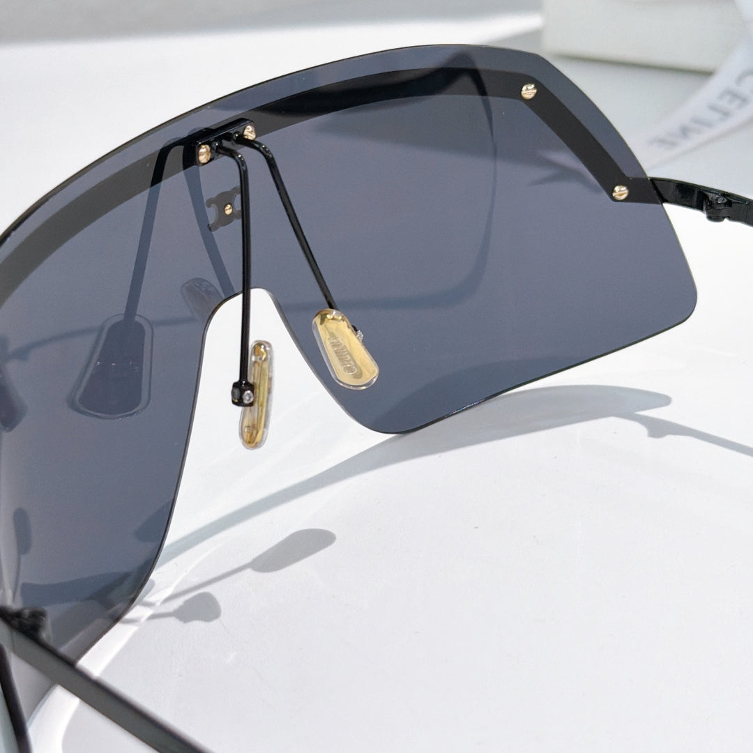 Celine shield sunglasses with dark frame and dark blue mirrored lenses