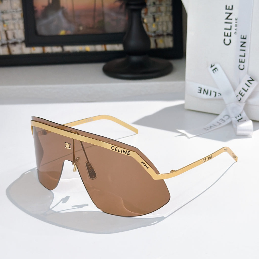 Celine shield sunglasses with gold frame and brown mirrored lenses