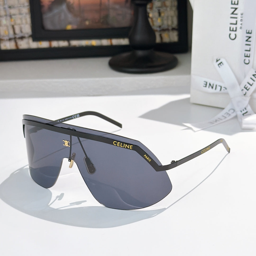 Celine shield sunglasses with black frame and dark blue mirrored lenses