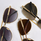 Set of Louis Vuitton sunglasses with gold frames and mixed dark lenses