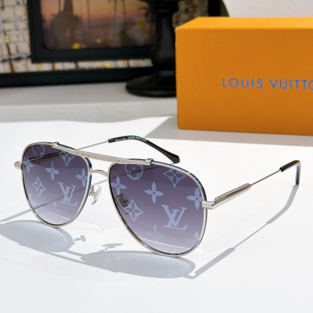 Louis Vuitton sunglasses with silver frame and navy monogram patterned lenses